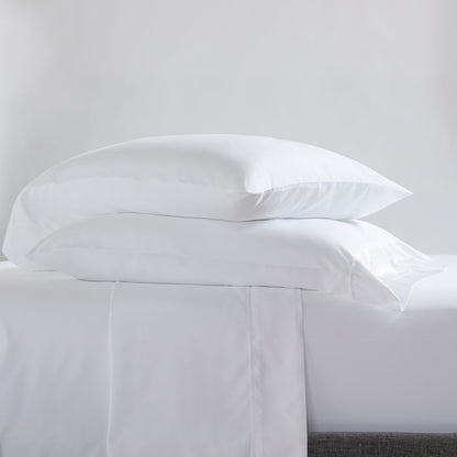 Two pillows on top of bed sheets in the Serta Classic Bedding Bundle