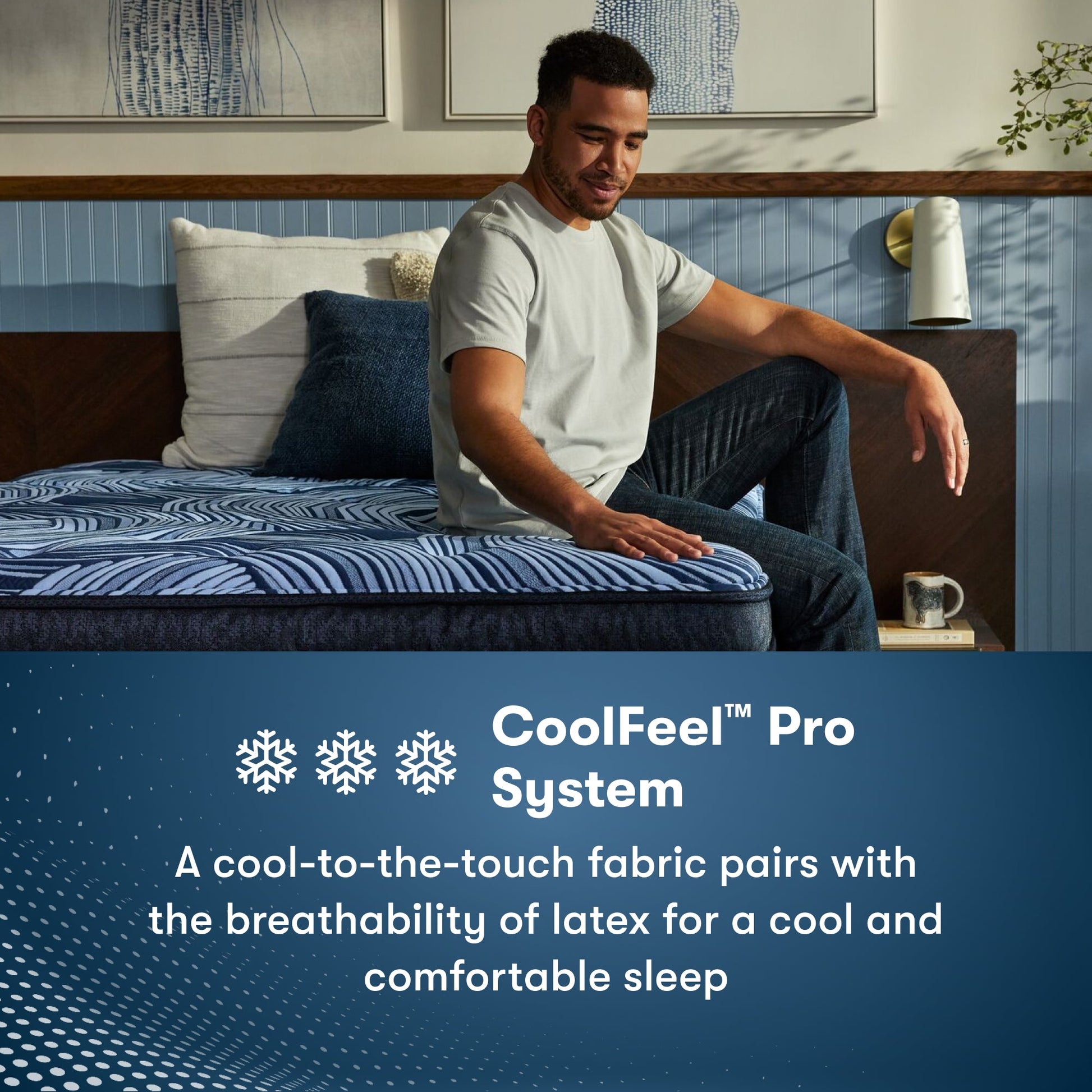 Man sitting on the right side of a Perfect Sleeper Pro Hampton Extra Firm Mattress feeling the cool to the touch top of the mattress || level: Level 1 || feel: Extra Firm