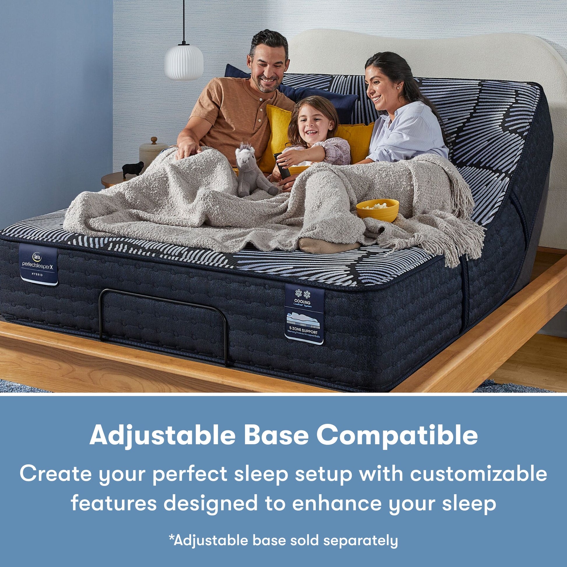 Family of 3 sitting on a Perfect Sleeper X Hybrid Aspen Firm Mattress sitting in the an adjustable base frame || feel: firm || level: Level 1