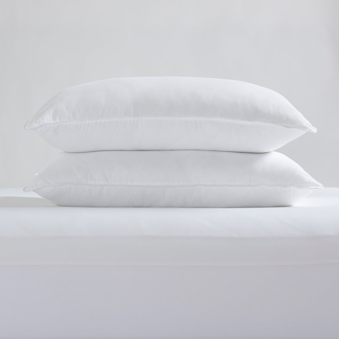 Two pillows from Serta Classic Bedding Bundle stacked