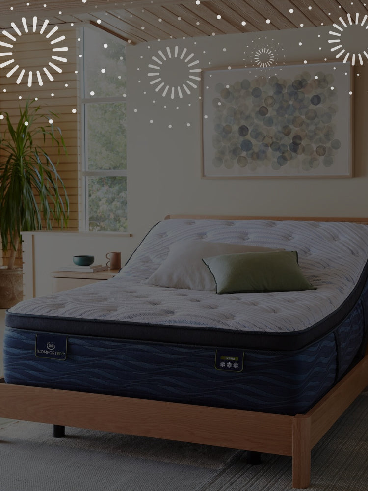 Serta iComfortECO mattress in a brown bed frame slightly elevated in an adjustable base