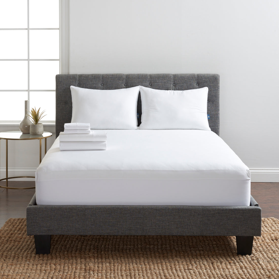 Serta Classic Bedding Bundle displayed on grey bed