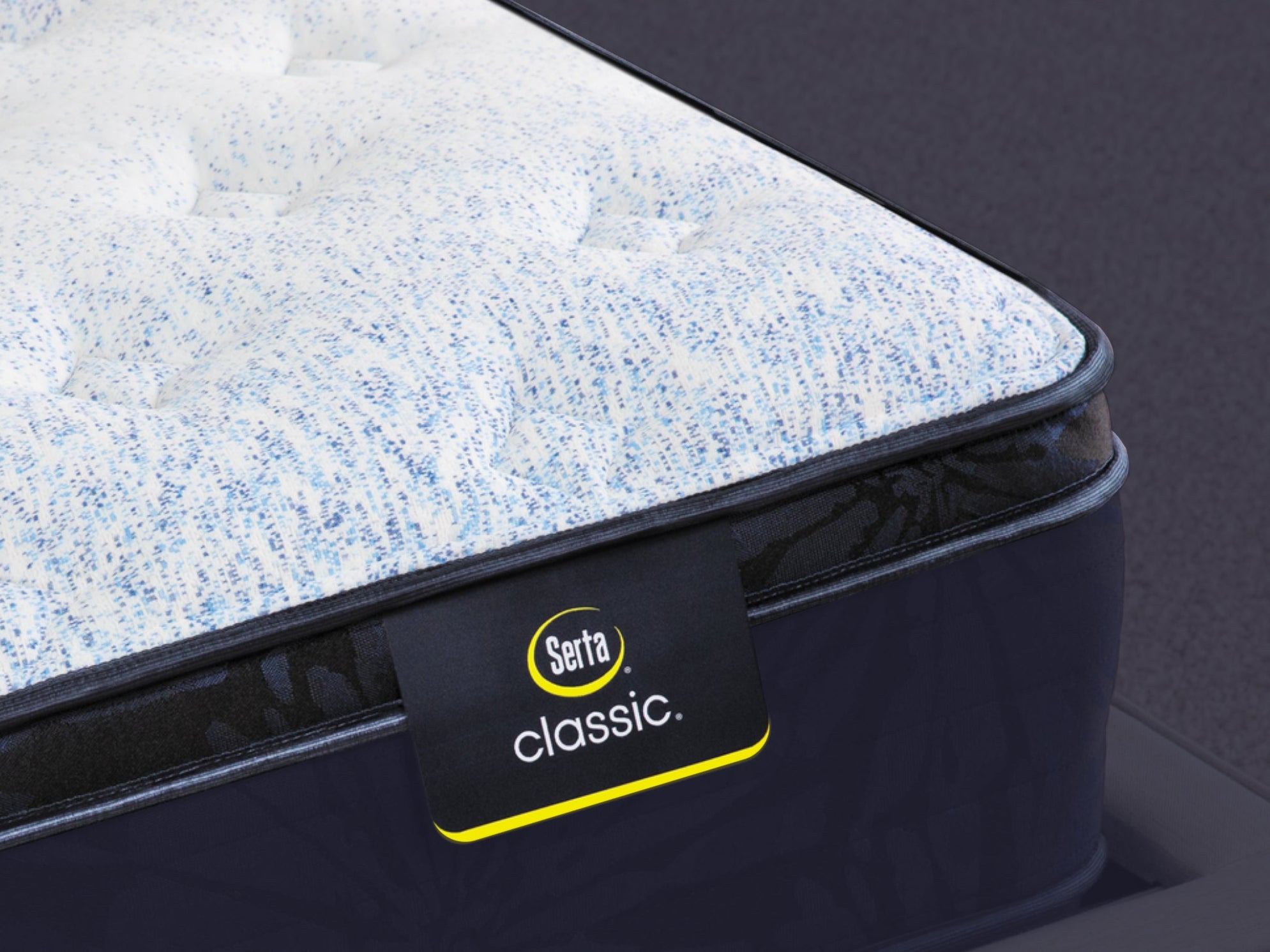 Close up of a Serta Classic mattress with a euro top.