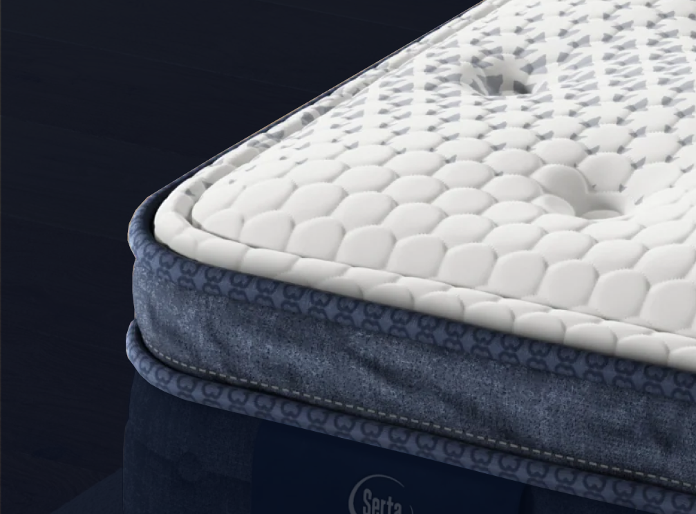 Close up image of the pillow top of a mattress 