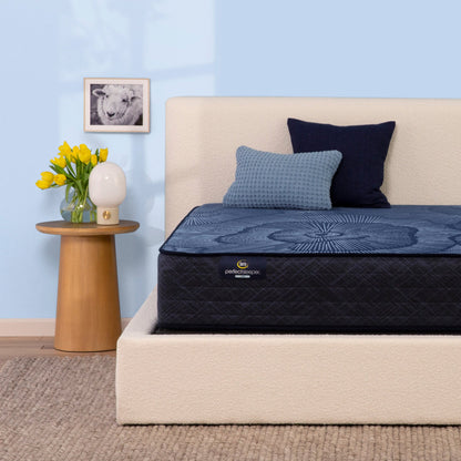 Serta Perfect Sleeper hybrid medium mattress on beige bed||feel: medium||level: standard