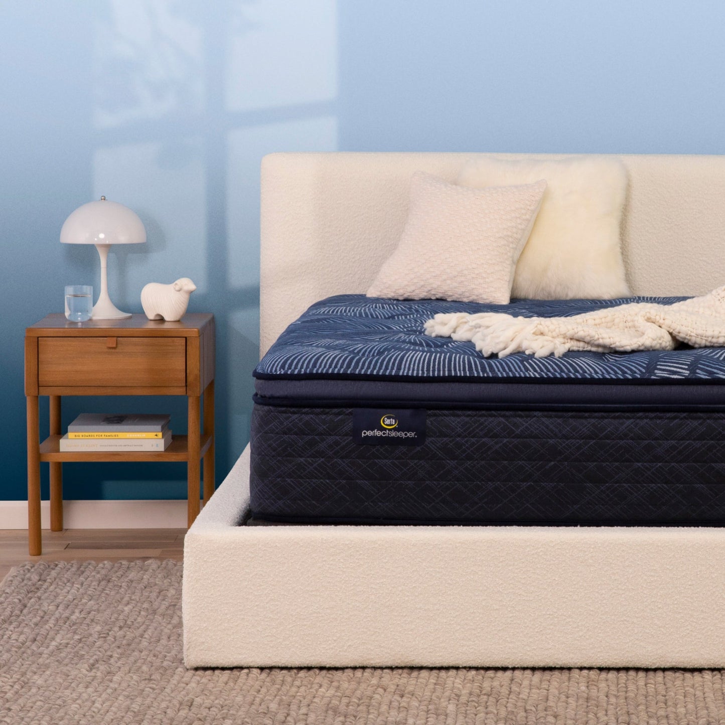 Serta Perfect Sleeper plush pillow top mattress in bedroom on beige bed||feel: plush pillow top||level: ultimate