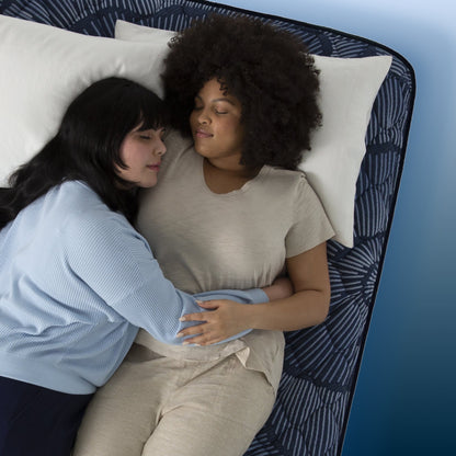 Two women sleeping in bed on a Serta Perfect Sleeper mattress||feel: plush pillow top||level: ultimate