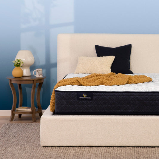 Serta Perfect Sleeper firm mattress in bedroom on beige bed||feel: firm||level: standard