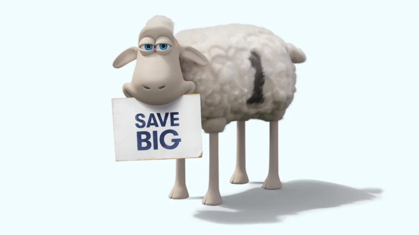 Serta sheep holding a save big sign in its mouth