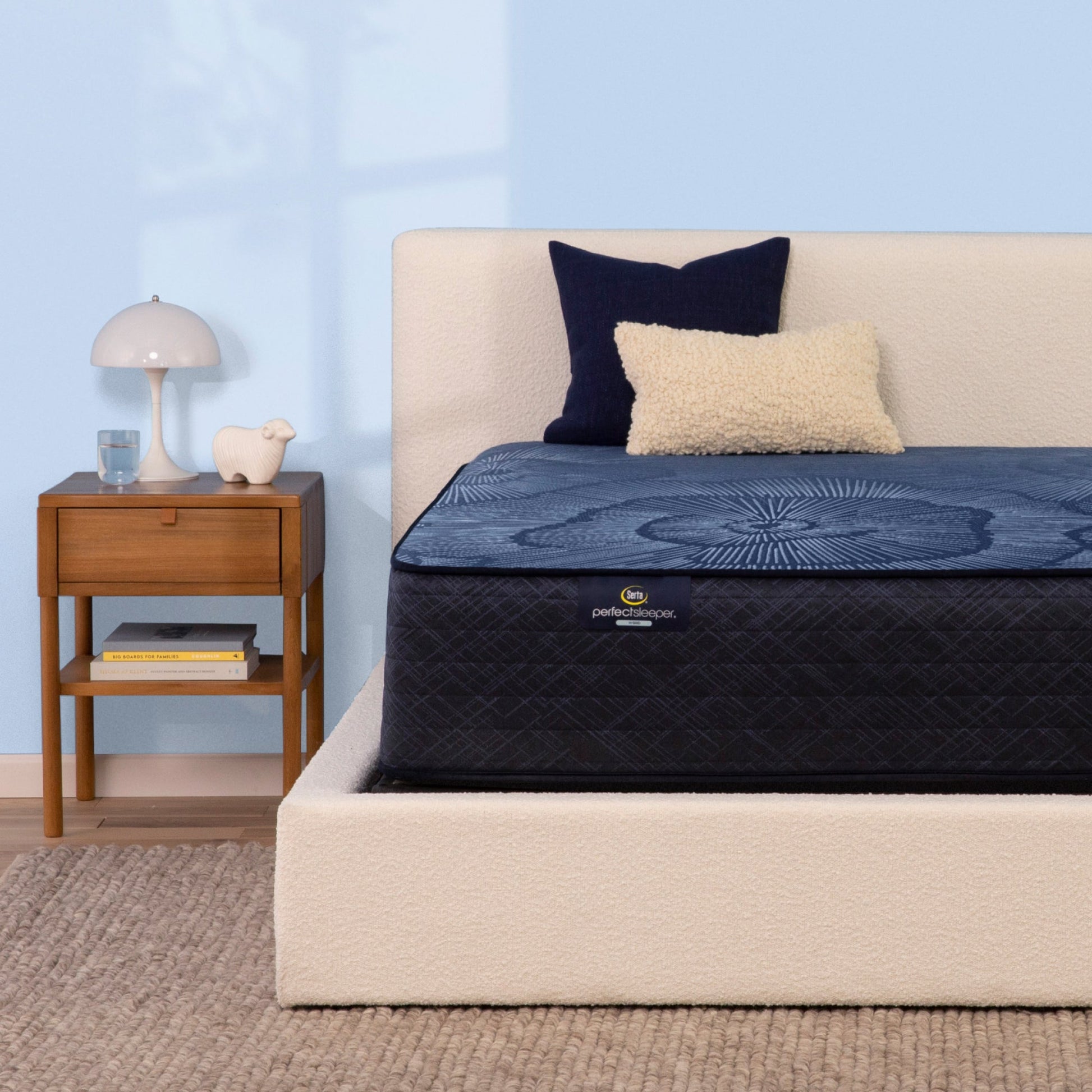 Serta Perfect Sleeper hybrid firm mattress on beige bed||feel: firm||level: enhanced