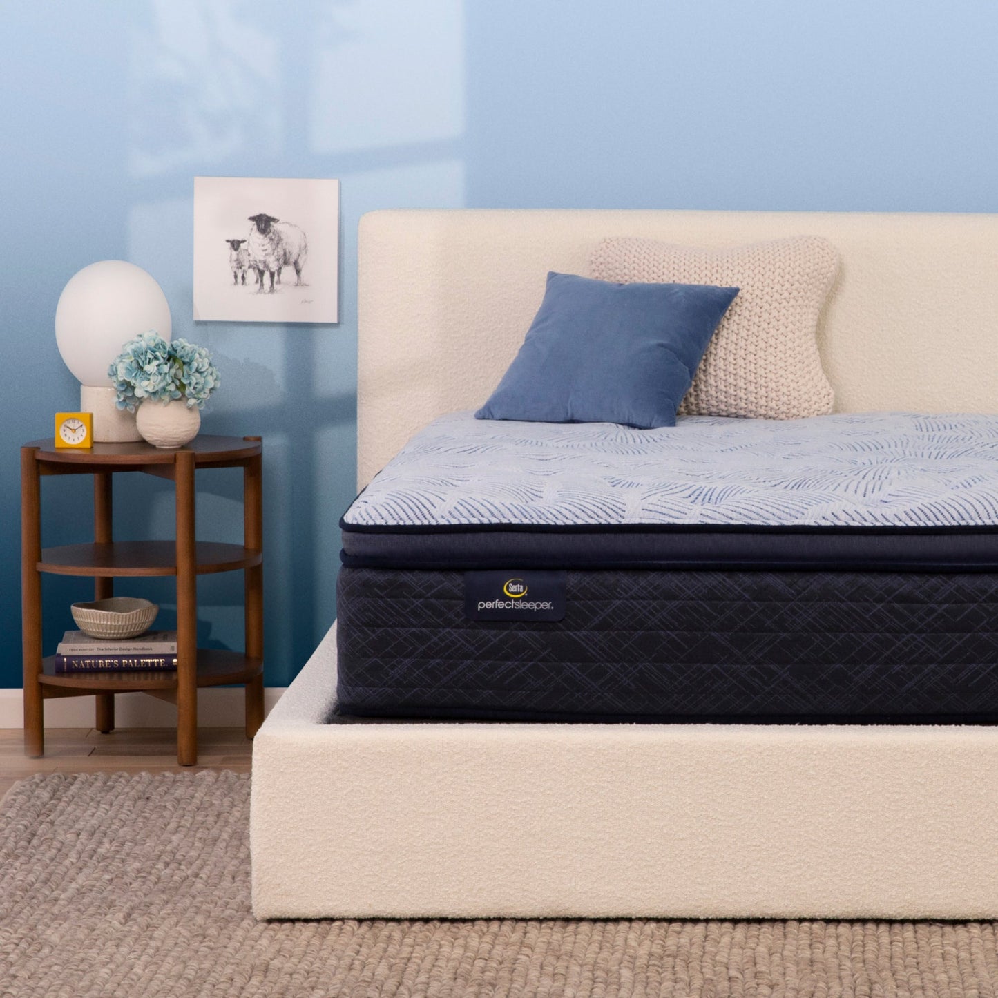 Serta Perfect Sleeper plush pillow top mattress in bedroom on beige bed||feel: plush pillow top||level: enhanced