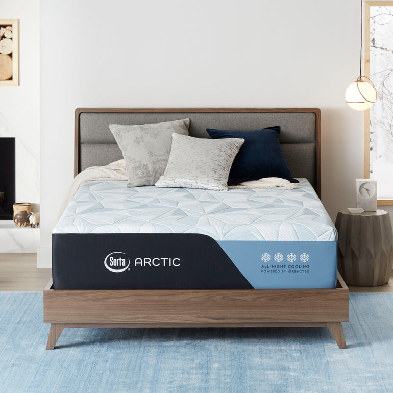 Serta Arctic foam mattress in a bedroom on a grey bed